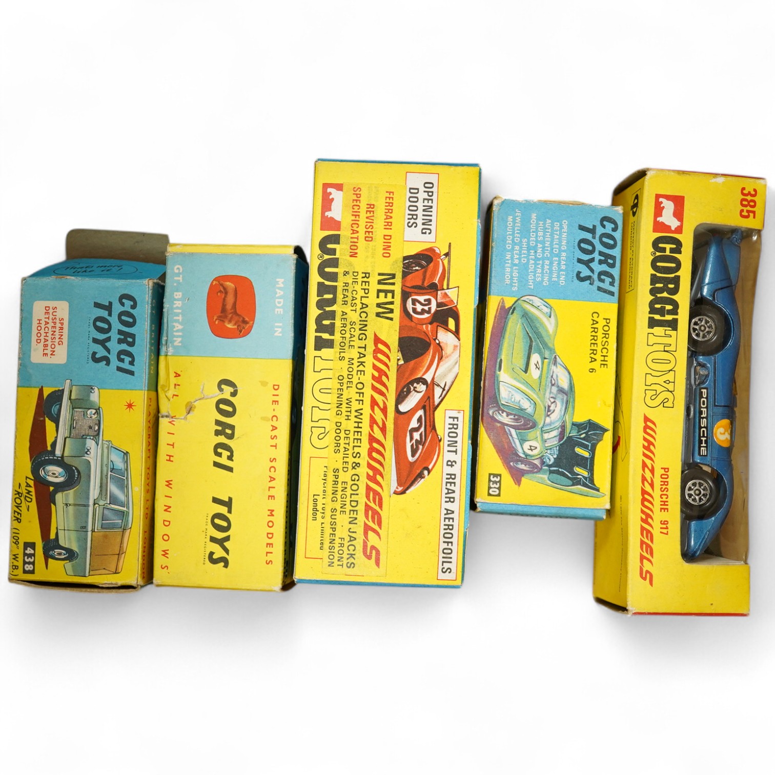 Five boxed Corgi Toys cars; a Porsche Carrera 6 (330) in red and white, a Land Rover 109” WB (438) in dark green, a Ford Thunderbird (214) in mint green and cream, a Whizzwheels Ferrari 206 Dino sport (344) in red with r